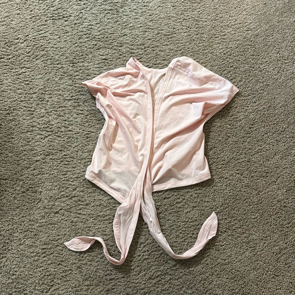Lululemon Tie Short Sleeve shirt. Pink. Women’s size 6.